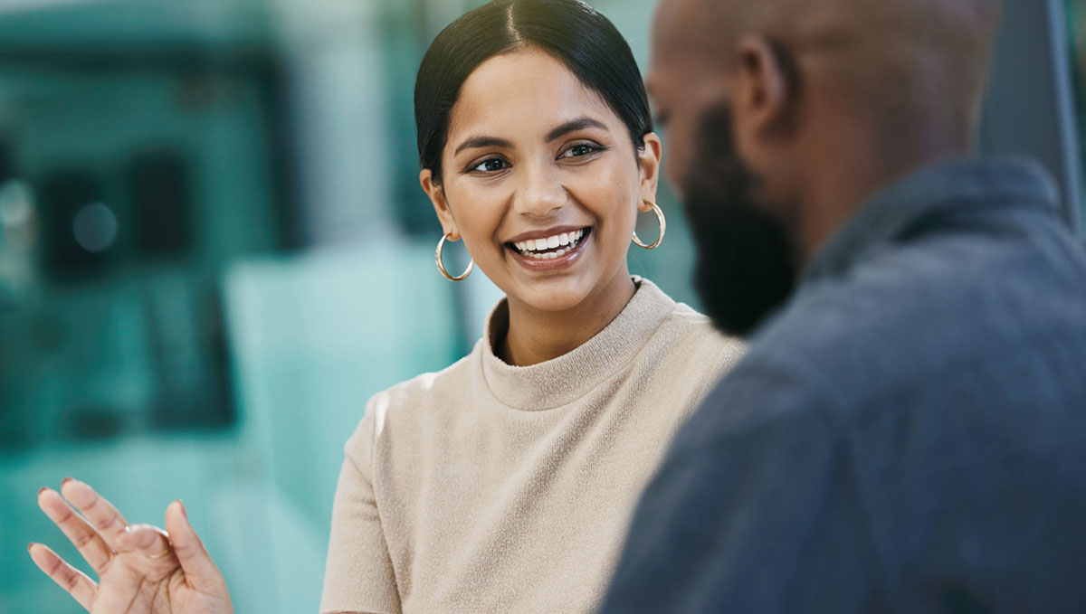 image showing a Mack Property employee explaining our Guaranteed Rent options